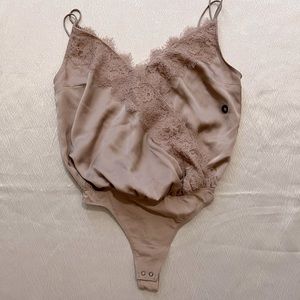 Silk, laced bodysuit